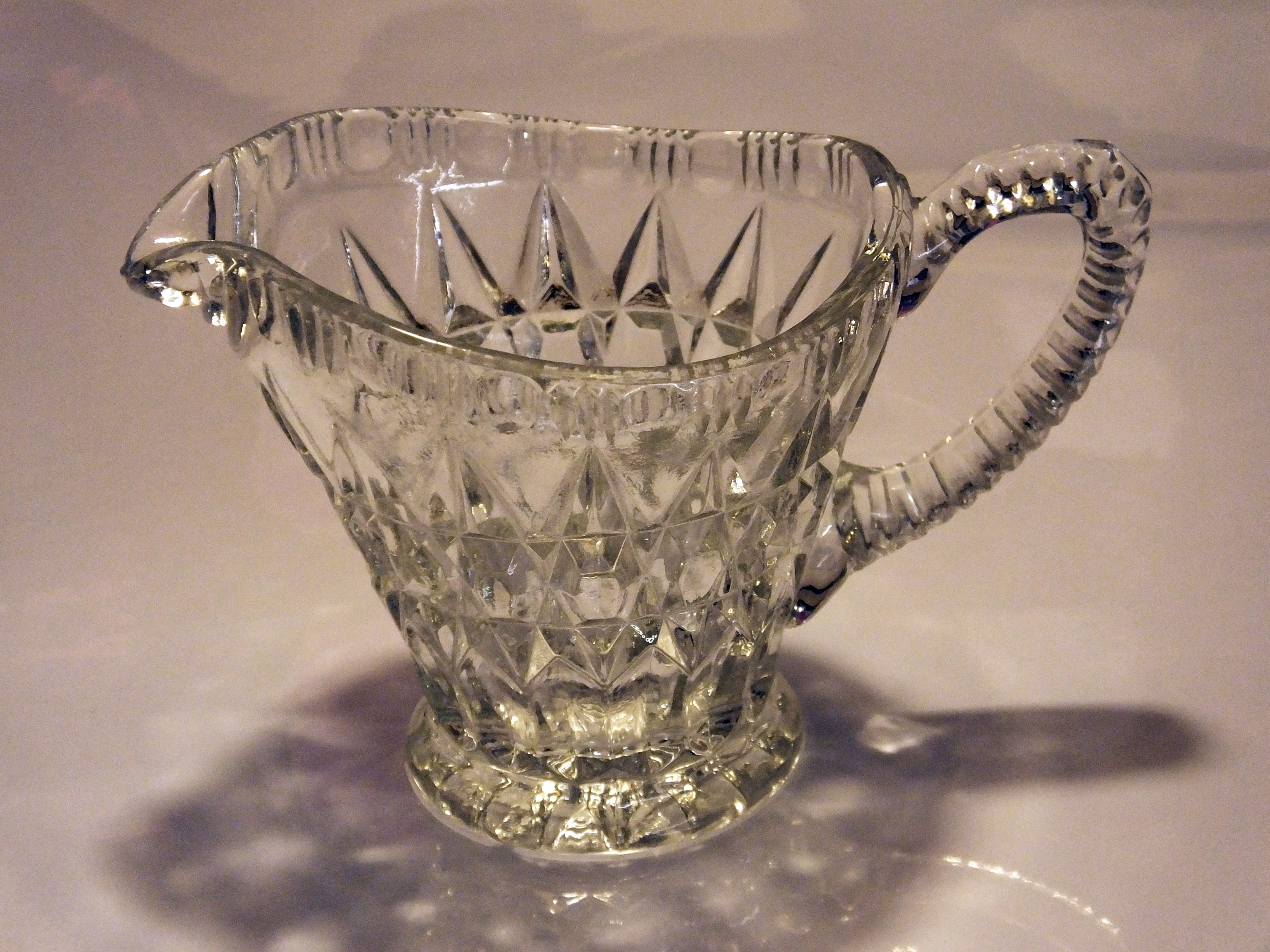 Small cut glass creamer. Bill Bagley Glass